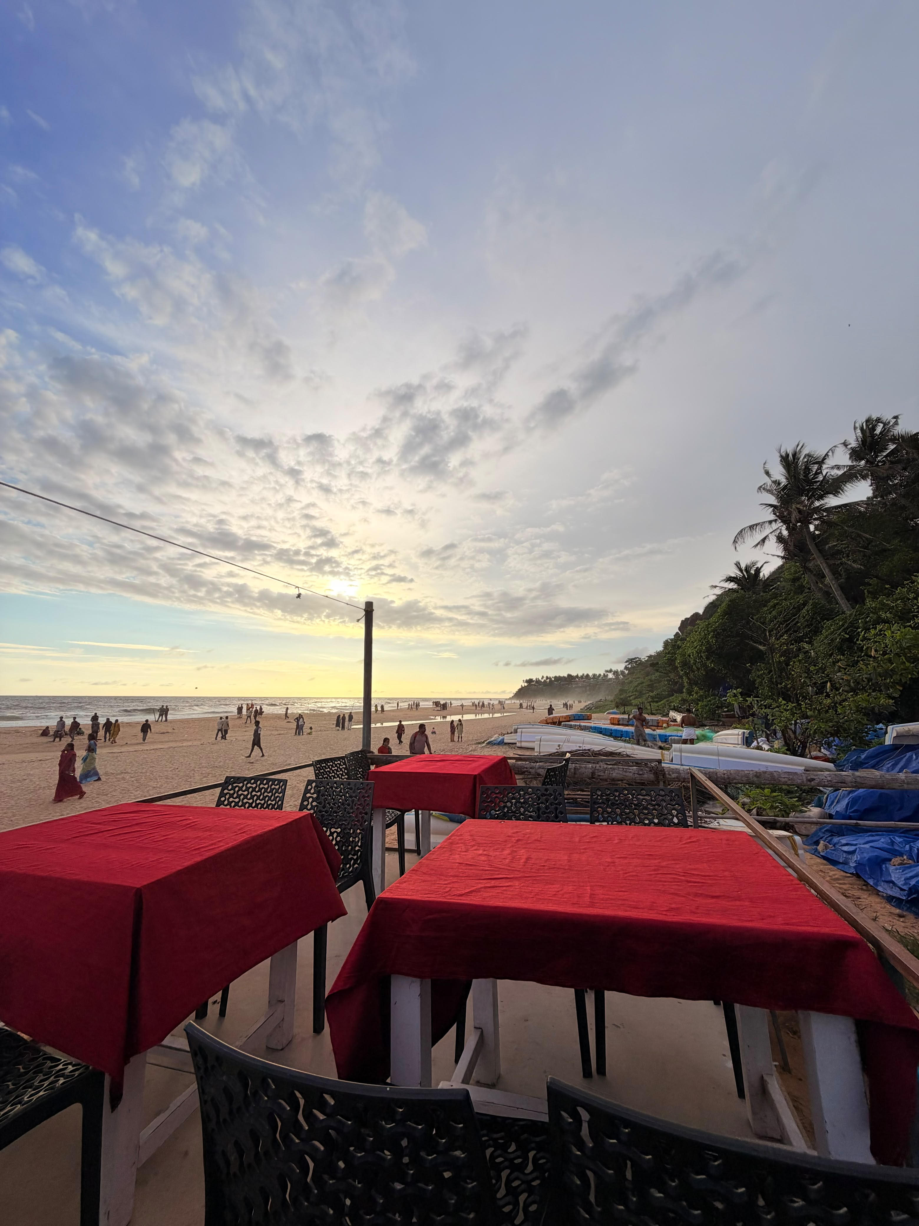 Beachfront dining at sunset